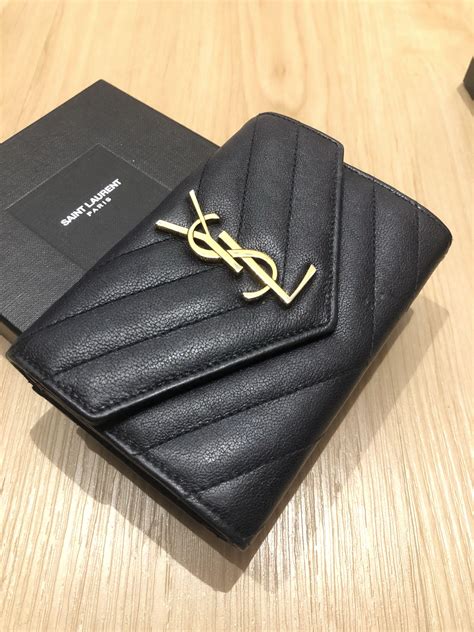 ysl rosé wallet|YSL wallet used.